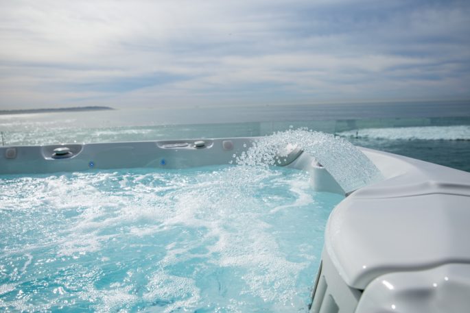 Experience the ease and comfort of a salt water hot tub vs traditional chlorine models.