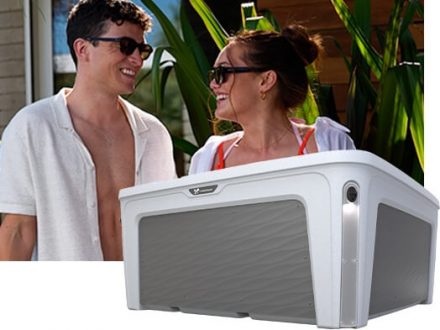 Couple enjoying time together on their way to relax in a Fantasy Series hot tub.